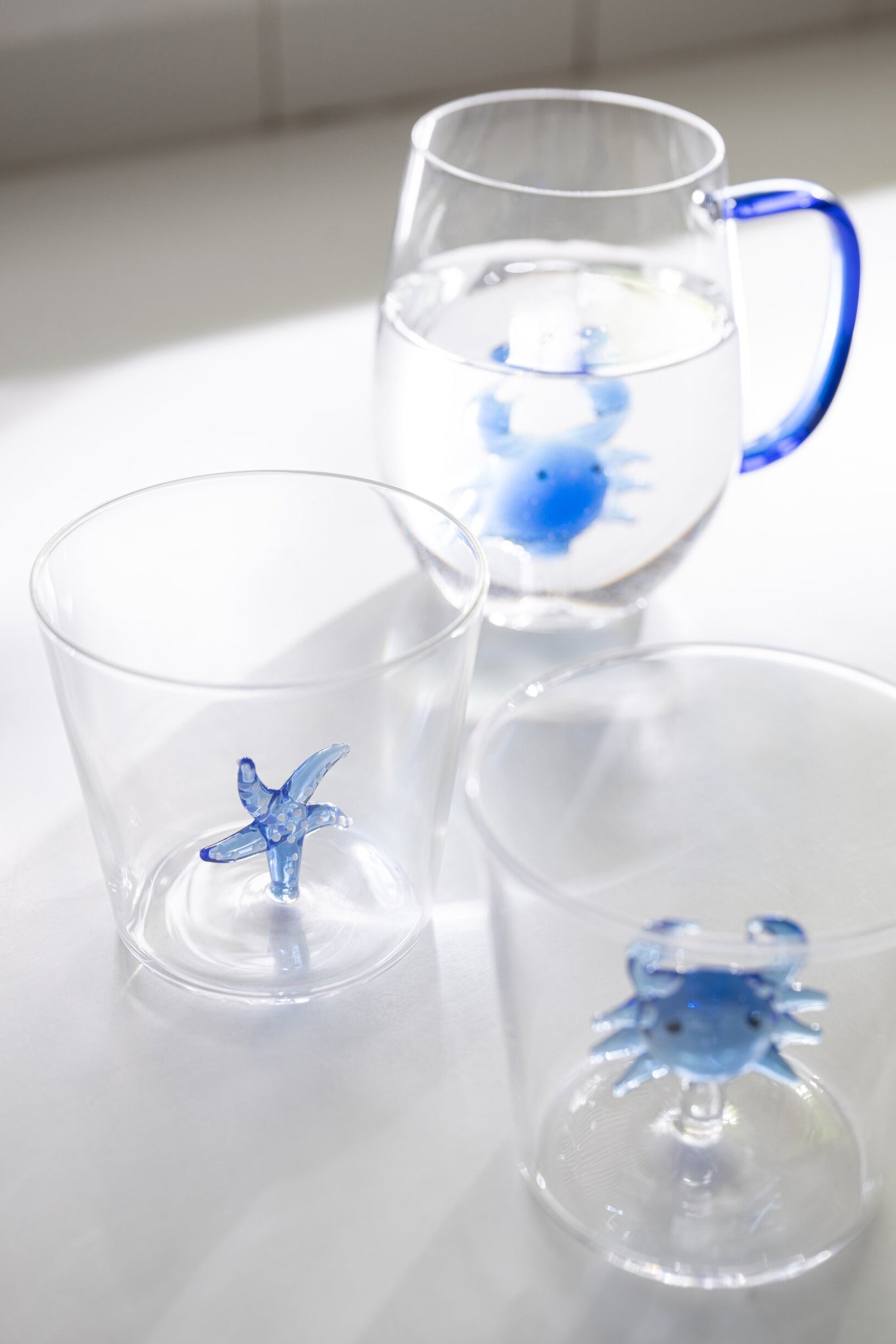 J-Line Waterglas Zeester/Krab met Oor Blauw/Transparant Assorti - 2 Stuks
