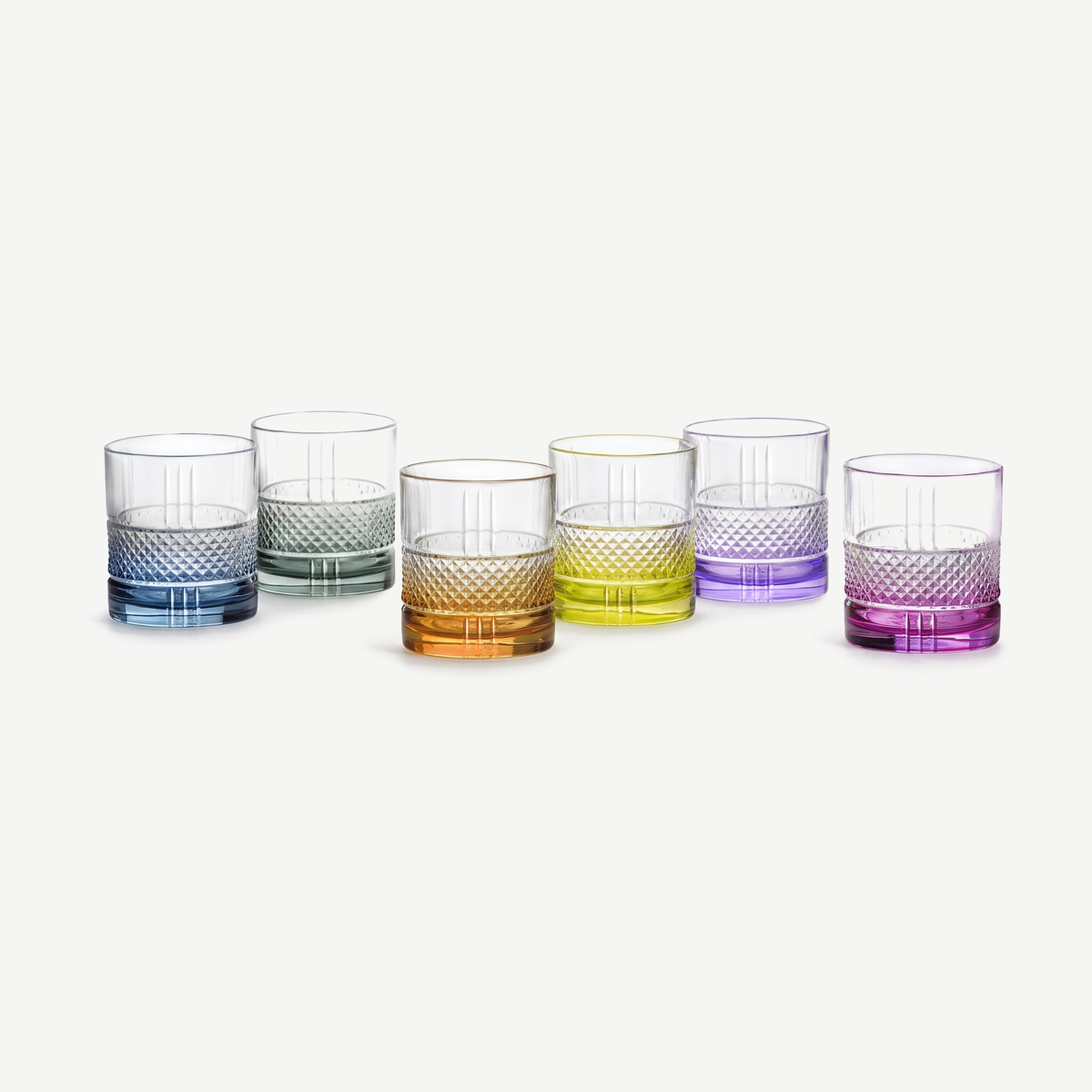 Zes lege RCR Brillante Colour tumblers van 34 cl in zes kleuren op een rij